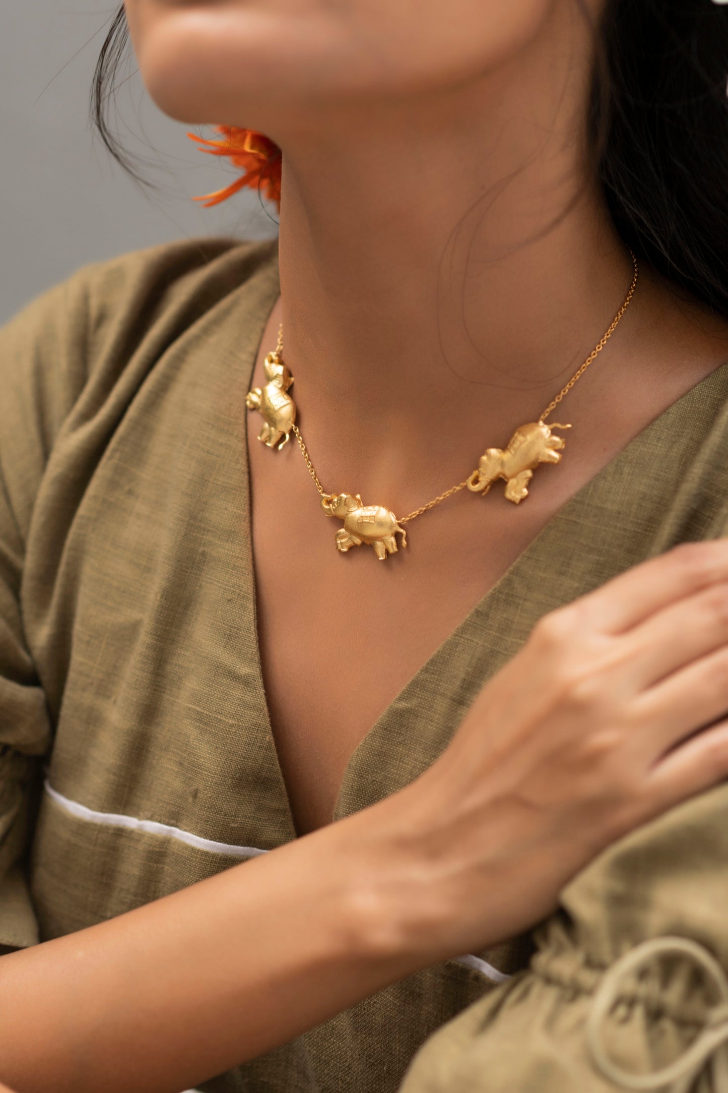 Asian elephants gold plated necklace